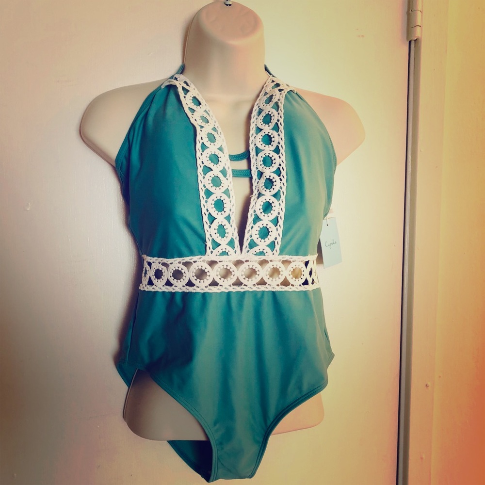 Stylish green one piece swimsuit with halter tie